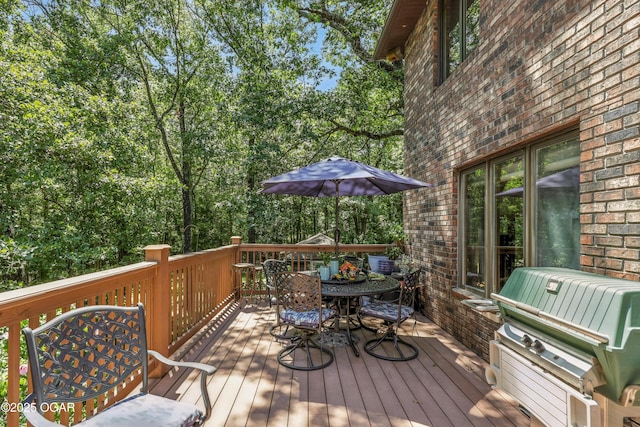 5623 Rivercrest Valley Dr, Joplin, MO 64804 - wooden terrace with outdoor dining area and grilling area
