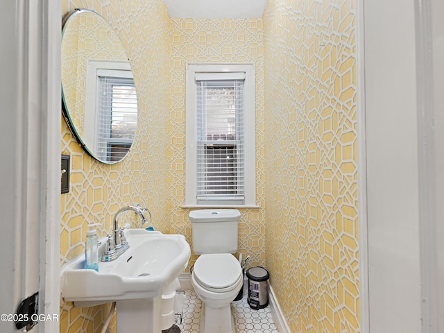 629 W Islington Pl, Joplin, MO 64801 - half bath with tile patterned flooring and wallpapered walls