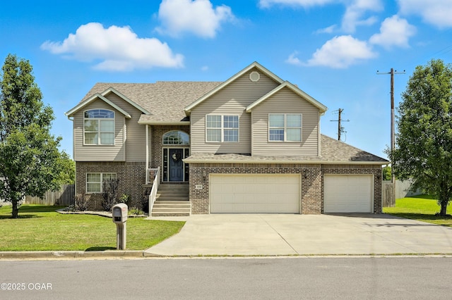 2256 N Greystone Sq, Webb City, MO 64870 - split foyer home featuring brick siding, driveway, a garage, and a shingled roof