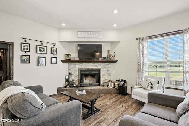 2256 N Greystone Sq, Webb City, MO 64870 - living room featuring wood finished floors, a fireplace, and recessed lighting