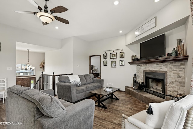 2256 N Greystone Sq, Webb City, MO 64870 - living area featuring dark wood-style floors, ceiling fan, recessed lighting, and a fireplace