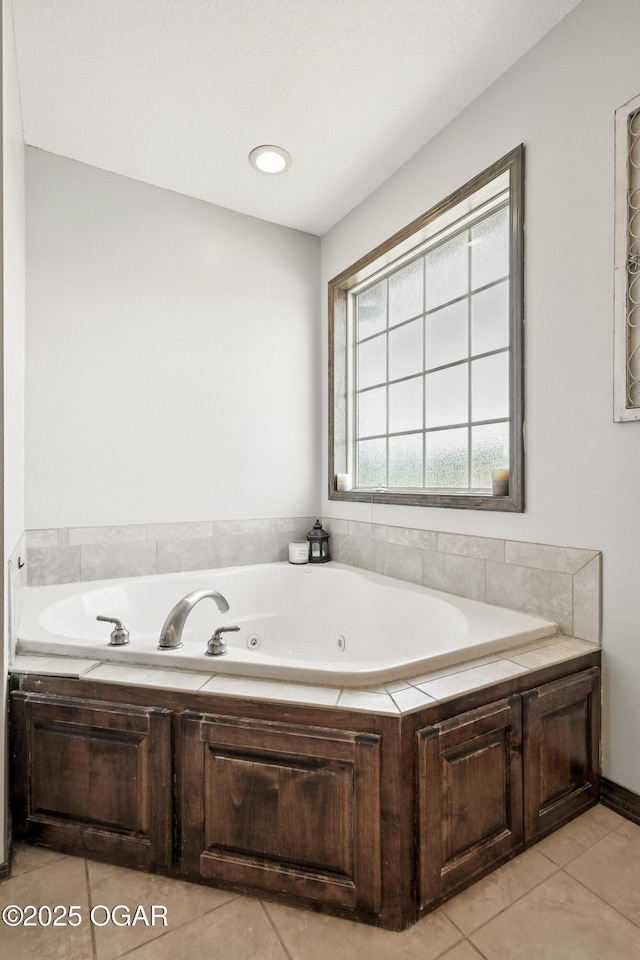 2256 N Greystone Sq, Webb City, MO 64870 - bathroom with a tub with jets and tile patterned floors