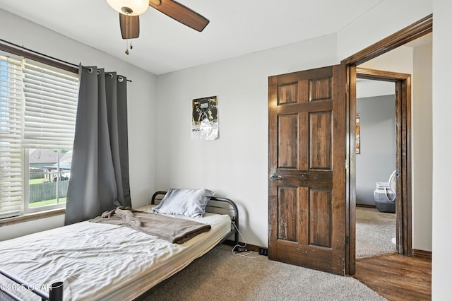 2256 N Greystone Sq, Webb City, MO 64870 - bedroom with wood finished floors and a ceiling fan