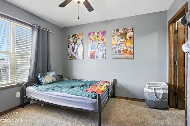 2256 N Greystone Sq, Webb City, MO 64870 - bedroom featuring multiple windows, carpet flooring, and ceiling fan