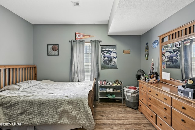 2256 N Greystone Sq, Webb City, MO 64870 - bedroom featuring dark wood-style flooring