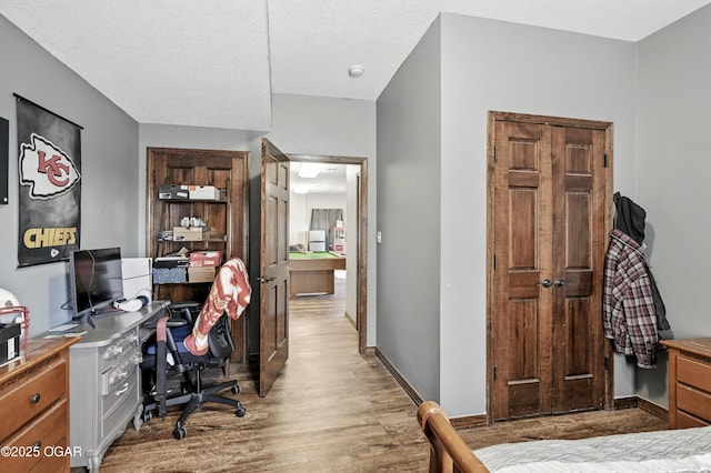 2256 N Greystone Sq, Webb City, MO 64870 - office with light wood-type flooring and a textured ceiling