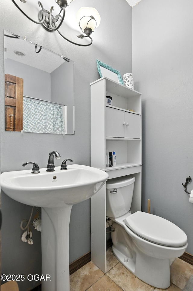 2256 N Greystone Sq, Webb City, MO 64870 - bathroom featuring toilet and tile patterned floors