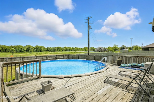 2256 N Greystone Sq, Webb City, MO 64870 - view of swimming pool featuring a deck and a fenced backyard