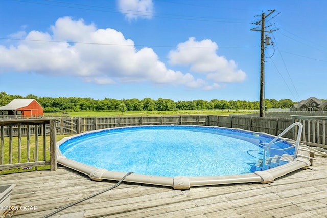 2256 N Greystone Sq, Webb City, MO 64870 - view of pool with a deck, a fenced backyard, and view of scattered trees