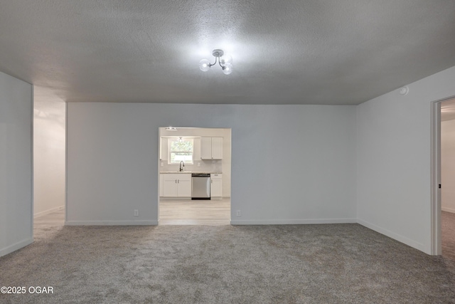 233 Timber Ln, Carl Junction, MO 64834 - empty room with light colored carpet, a textured ceiling, and a smoke detector