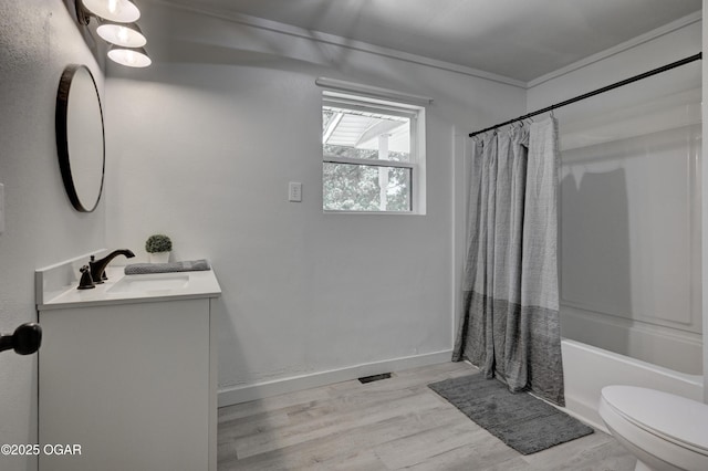 233 Timber Ln, Carl Junction, MO 64834 - bathroom featuring vanity, wood finished floors, shower / bath combo, and ornamental molding