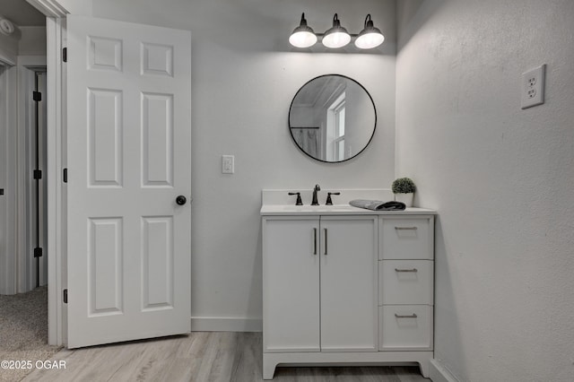 233 Timber Ln, Carl Junction, MO 64834 - bathroom with vanity and wood finished floors