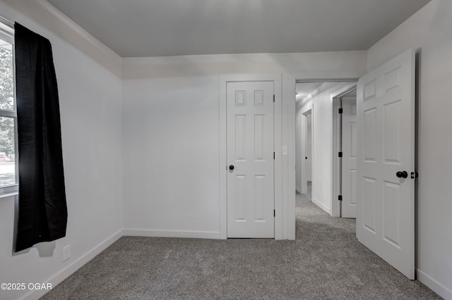 233 Timber Ln, Carl Junction, MO 64834 - carpeted spare room featuring baseboards