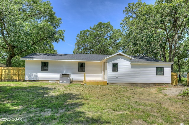 233 Timber Ln, Carl Junction, MO 64834 - rear view of house with a shingled roof and crawl space