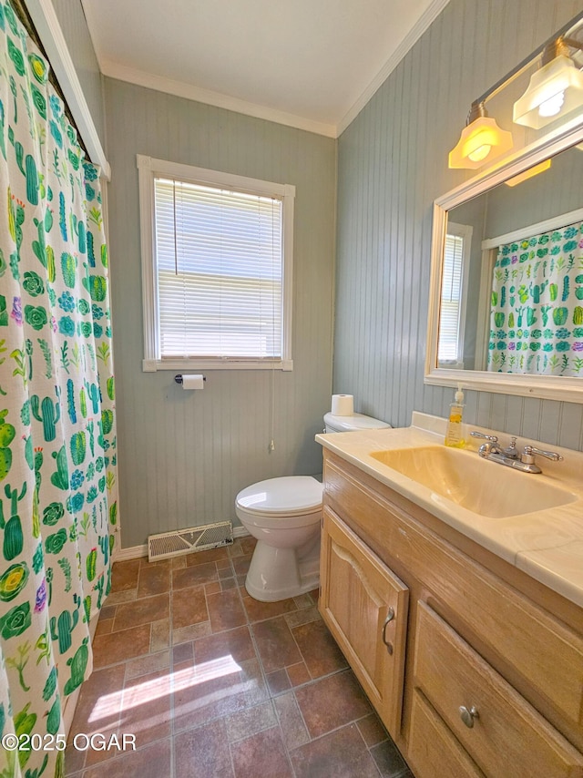 2507 N Ozark Ave, Joplin, MO 64801 - full bath featuring stone tile flooring, vanity, and crown molding
