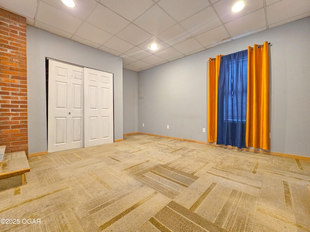 2507 N Ozark Ave, Joplin, MO 64801 - unfurnished bedroom featuring carpet flooring, a closet, recessed lighting, and a drop ceiling