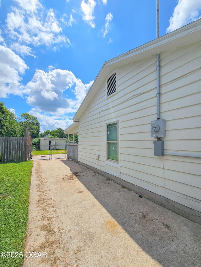 2507 N Ozark Ave, Joplin, MO 64801 - view of side of home featuring a gate