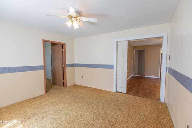 400 Broadway St, Lamar, MO 64759 - carpeted spare room featuring ceiling fan