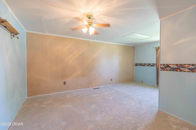 400 Broadway St, Lamar, MO 64759 - carpeted spare room featuring attic access and a ceiling fan