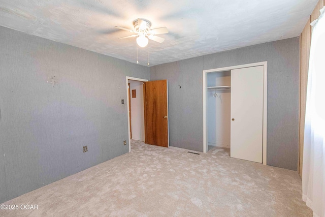 400 Broadway St, Lamar, MO 64759 - unfurnished bedroom with carpet floors, a closet, and ceiling fan