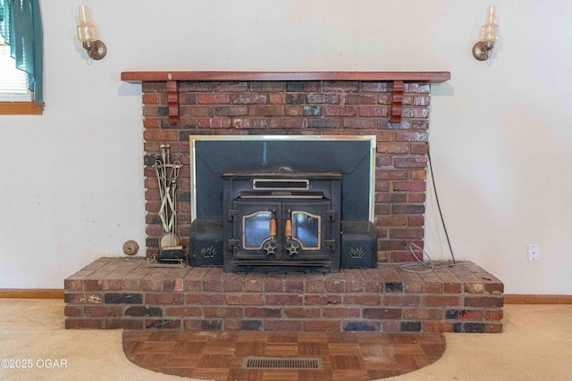 400 Broadway St, Lamar, MO 64759 - detailed view of a wood stove and carpet
