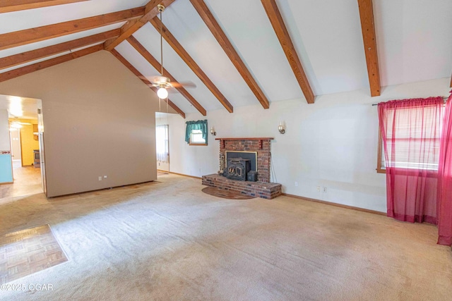 400 Broadway St, Lamar, MO 64759 - unfurnished living room featuring a ceiling fan, beam ceiling, carpet flooring, and high vaulted ceiling