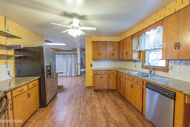 400 Broadway St, Lamar, MO 64759 - kitchen featuring stainless steel appliances, open shelves, a ceiling fan, and tasteful backsplash