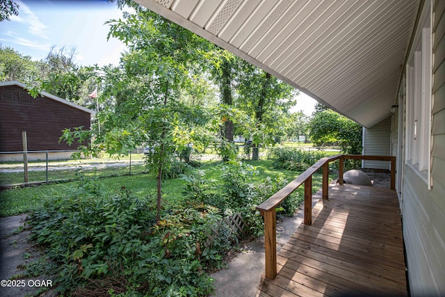400 Broadway St, Lamar, MO 64759 - wooden terrace featuring a fenced backyard