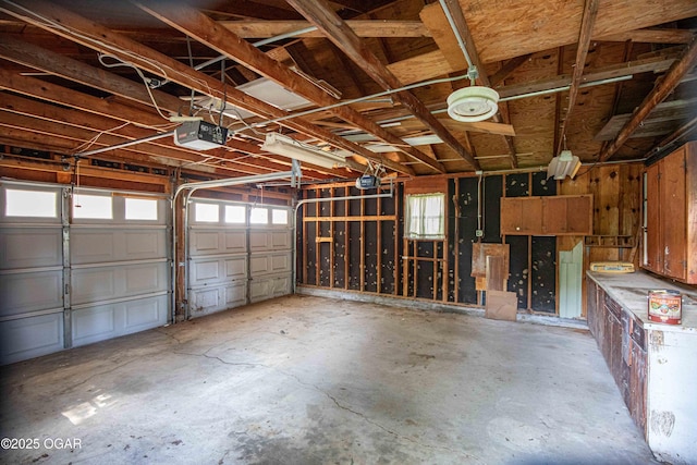 400 Broadway St, Lamar, MO 64759 - garage featuring a garage door opener