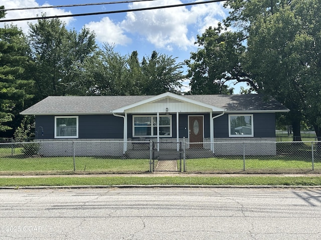 2022 W 4th St, Joplin, MO 64801 - view of front of house featuring roof with shingles, a fenced front yard, and a gate
