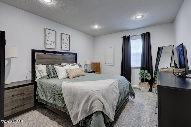 715 Wilson St, Webb City, MO 64870 - bedroom with carpet, a textured ceiling, and recessed lighting