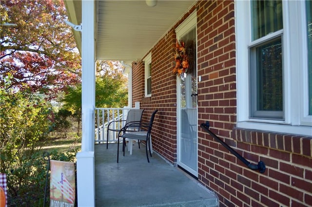 view of patio featuring a porch