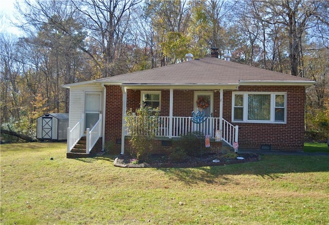 bungalow featuring a shed and a front yard