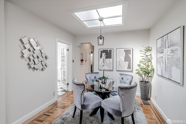 dining area featuring baseboards