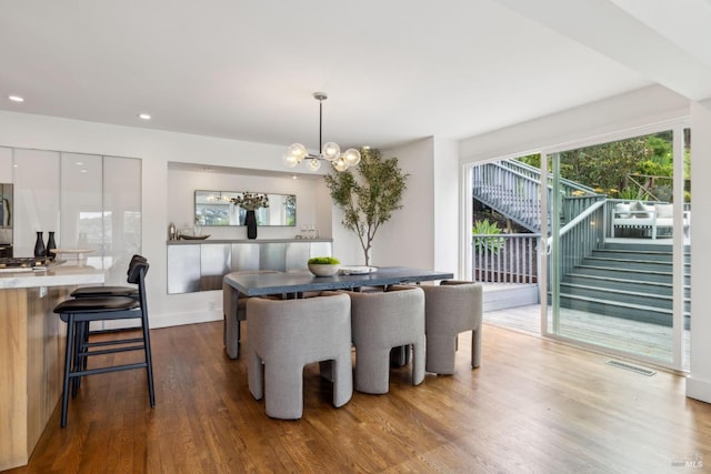1837 Centro W St, Tiburon, CA 94920 - dining room with wood finished floors, baseboards, visible vents, recessed lighting, and an inviting chandelier