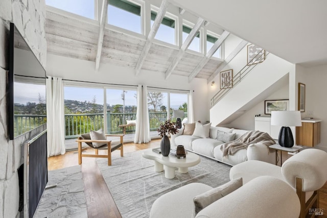 1837 Centro W St, Tiburon, CA 94920 - living room with a fireplace, high vaulted ceiling, wood finished floors, and beam ceiling