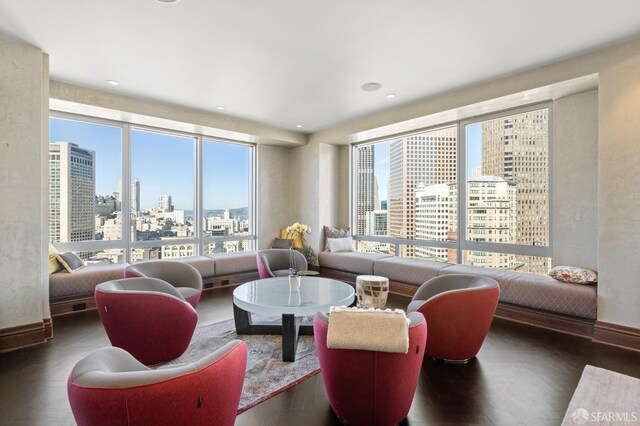 765 Market St Unit 28D, San Francisco, CA 94103 - living room featuring a skyline view, wood finished floors, and recessed lighting
