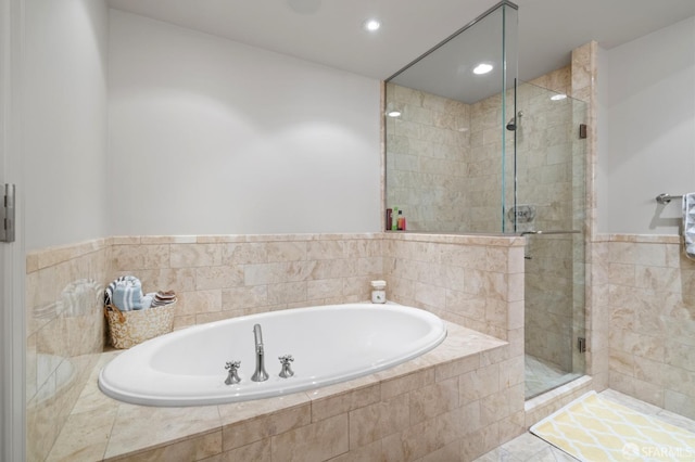 765 Market St Unit 28D, San Francisco, CA 94103 - full bath featuring a shower stall, a garden tub, and recessed lighting