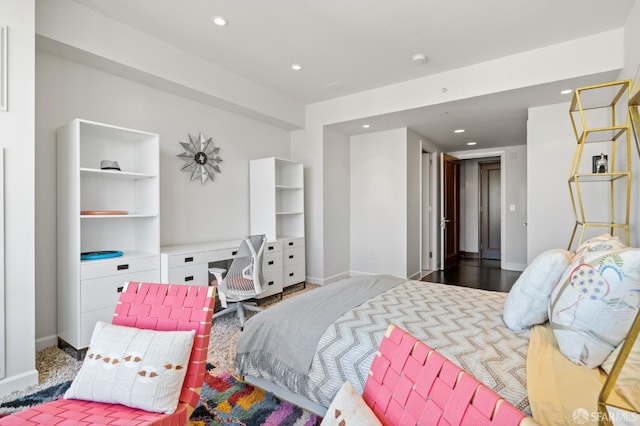 bedroom featuring dark hardwood / wood-style flooring