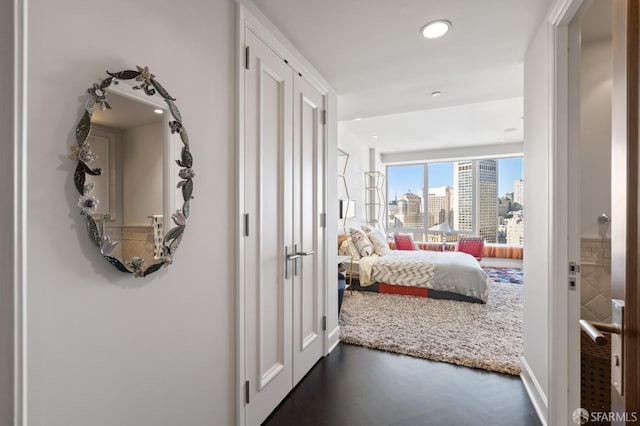 765 Market St Unit 28D, San Francisco, CA 94103 - corridor with baseboards, recessed lighting, and a view of city