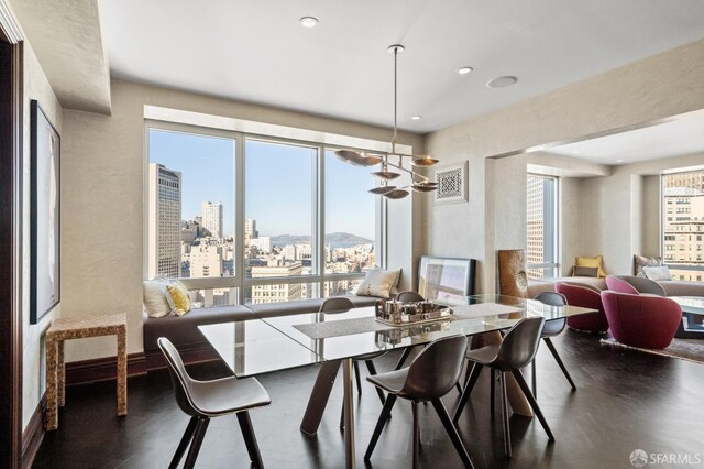 765 Market St Unit 28D, San Francisco, CA 94103 - dining area featuring a view of city, dark wood finished floors, and recessed lighting