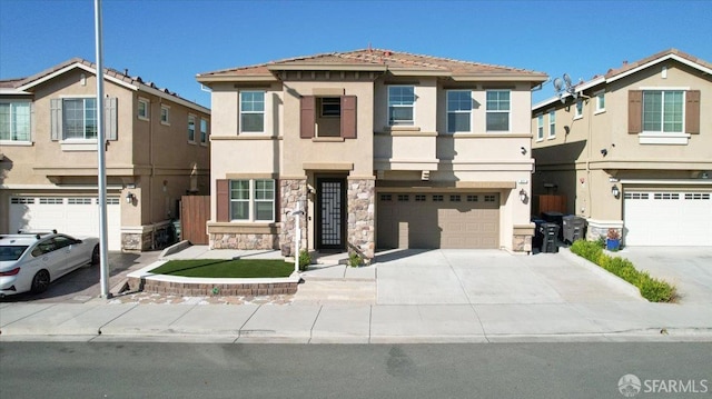 67 Greystone Pl, Pittsburg, CA 94565 - view of front of house with stucco siding, stone siding, a garage, and driveway