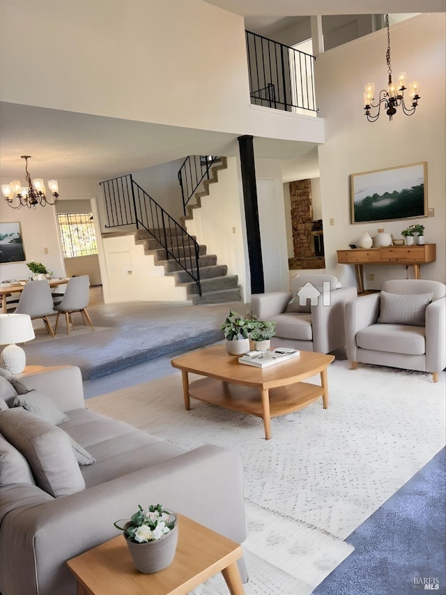 living room with carpet floors and a chandelier