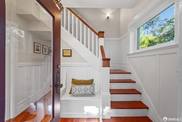 stairway with wood-type flooring