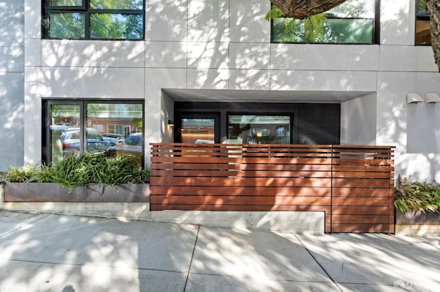 view of front of house featuring stucco siding