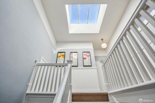 stairway with a skylight