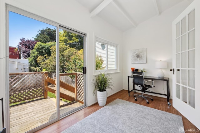 entryway featuring an office area and wood finished floors