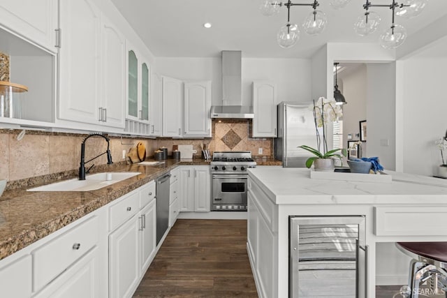 115 Magnolia St, San Francisco, CA 94123 - kitchen featuring wall chimney range hood, a sink, stainless steel appliances, wine cooler, and dark wood-style floors