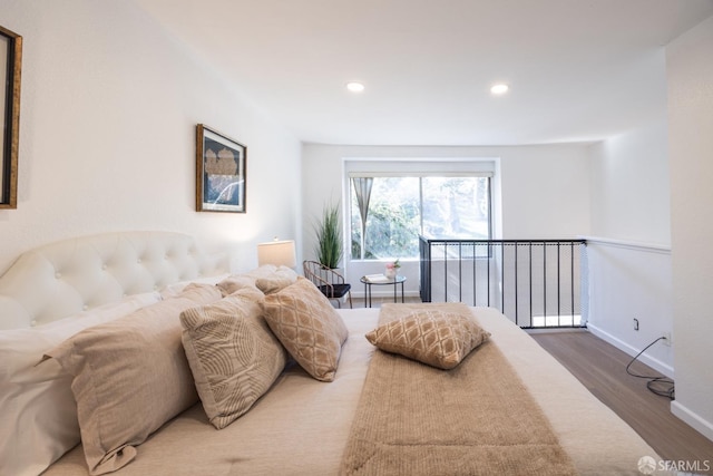 bedroom featuring hardwood / wood-style floors