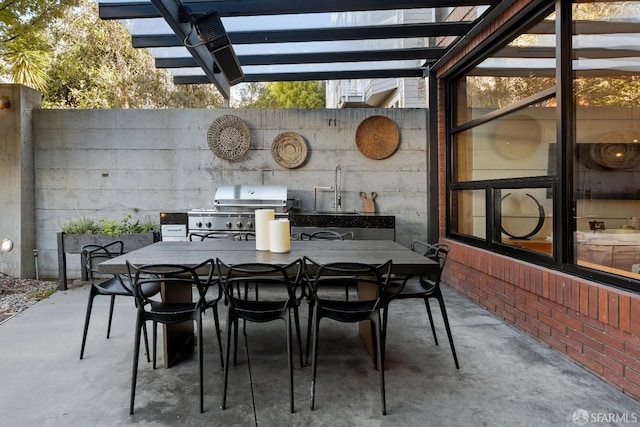 view of patio / terrace featuring sink and area for grilling